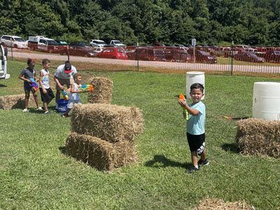 Children playing with water guns